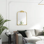 Miroir mural arqué baroque doré