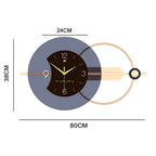 Horloge murale design graphique noir et doré avec cerclage décoratif 80 cm